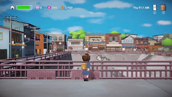 橋の上でネコを見つめる主人公