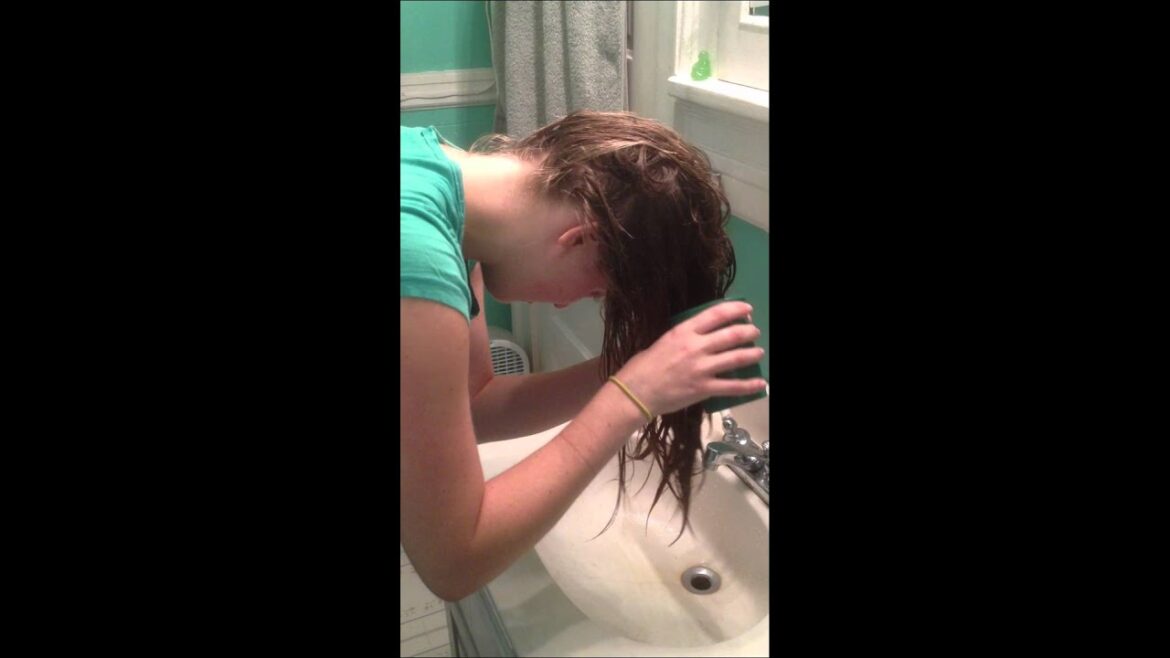 Applying Dr. Bronner's Conditioning Rinse