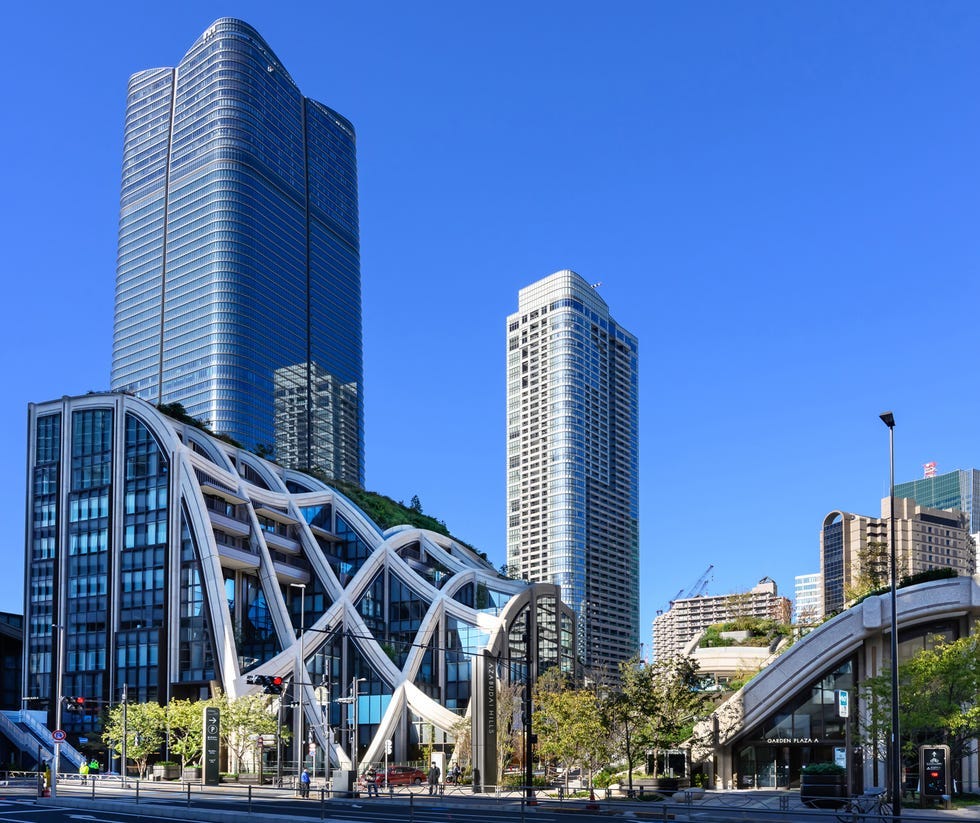modern architecture with distinctive curved structures and tall skyscrapers