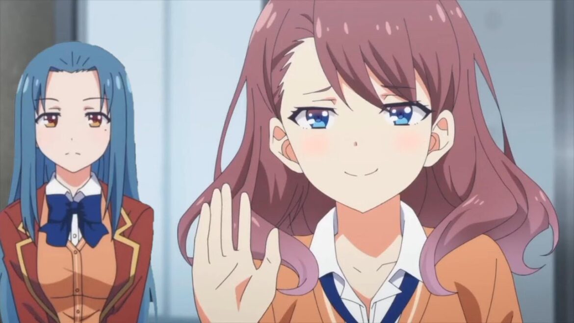 手を振る佐藤