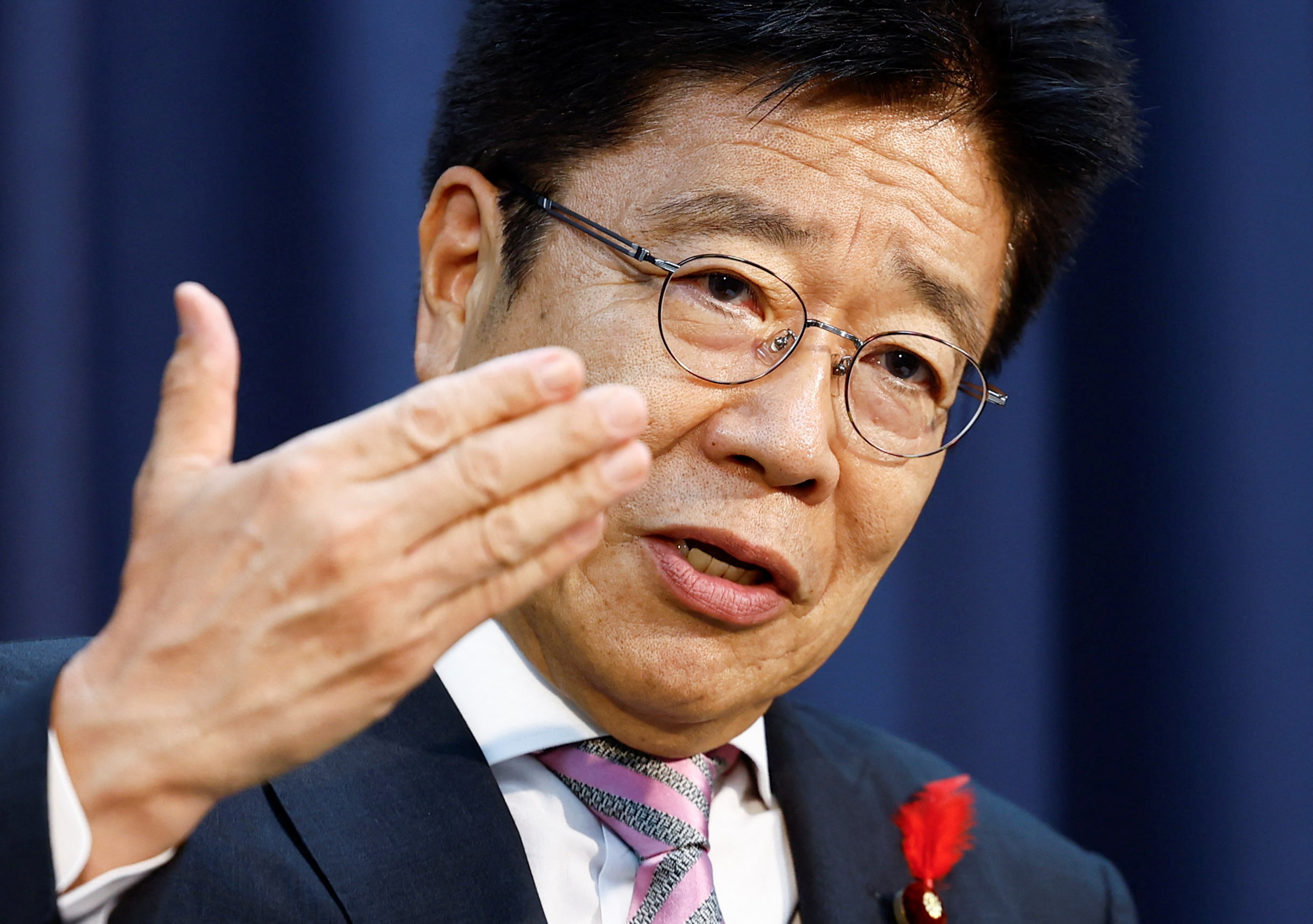 加藤金融相、株主総会前の有報開示を要請　全上場企業に
