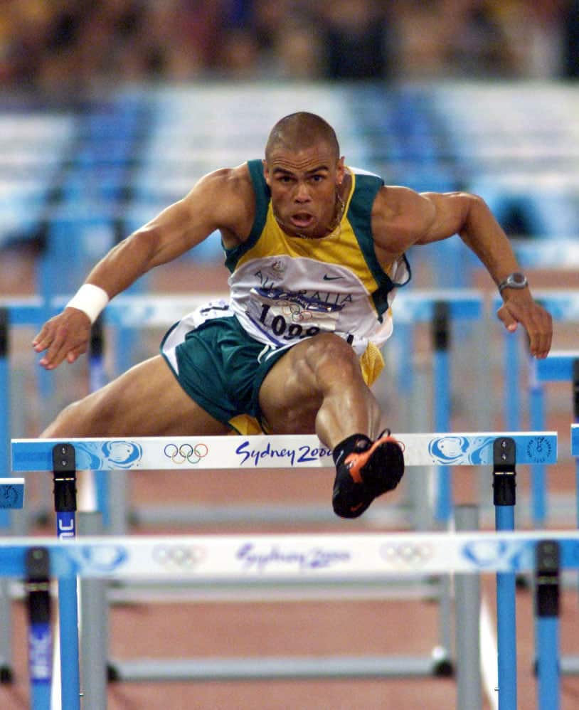 Kyle Vander-Kuyp competing in the hurdles at the Sydney 2000 Olympics – image supplied.jpeg